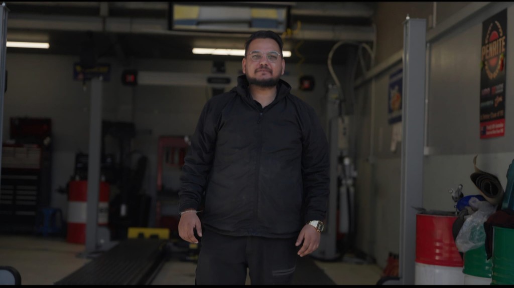 Taran at the Auto Surgeons workshop in Tauranga